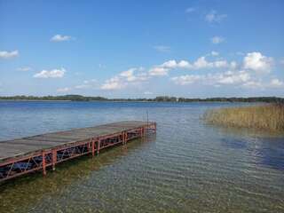 Дома для отпуска Bajkowy Domek Nad Samym Jeziorem Нарты Дом для отпуска-41